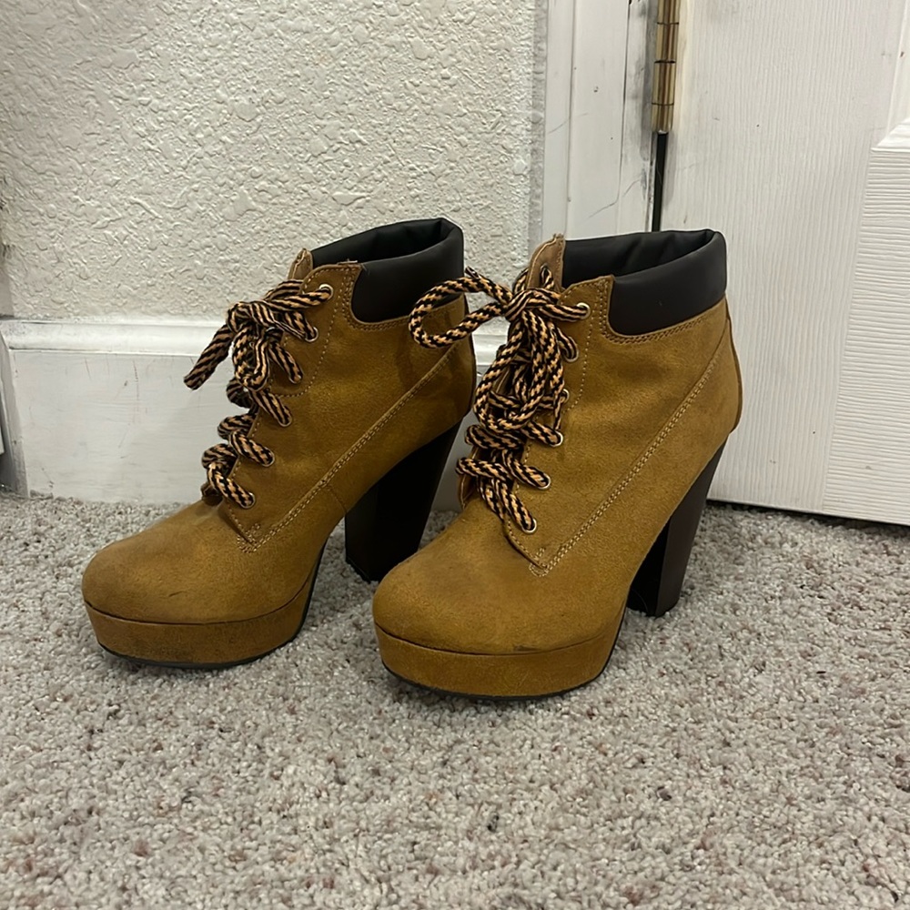 Women heeled “work boots”